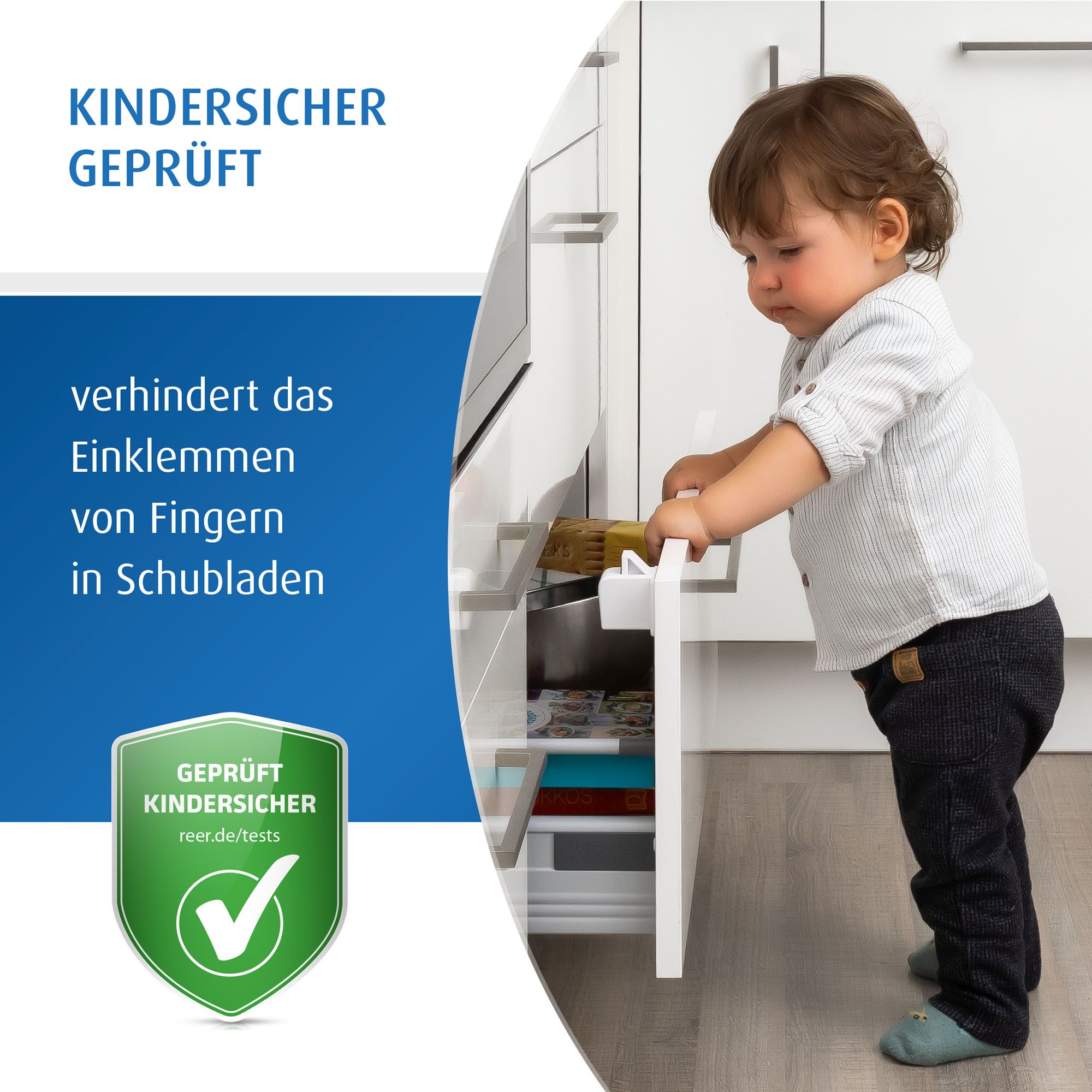 Kind an Schublade mit Schubladen-Stopp