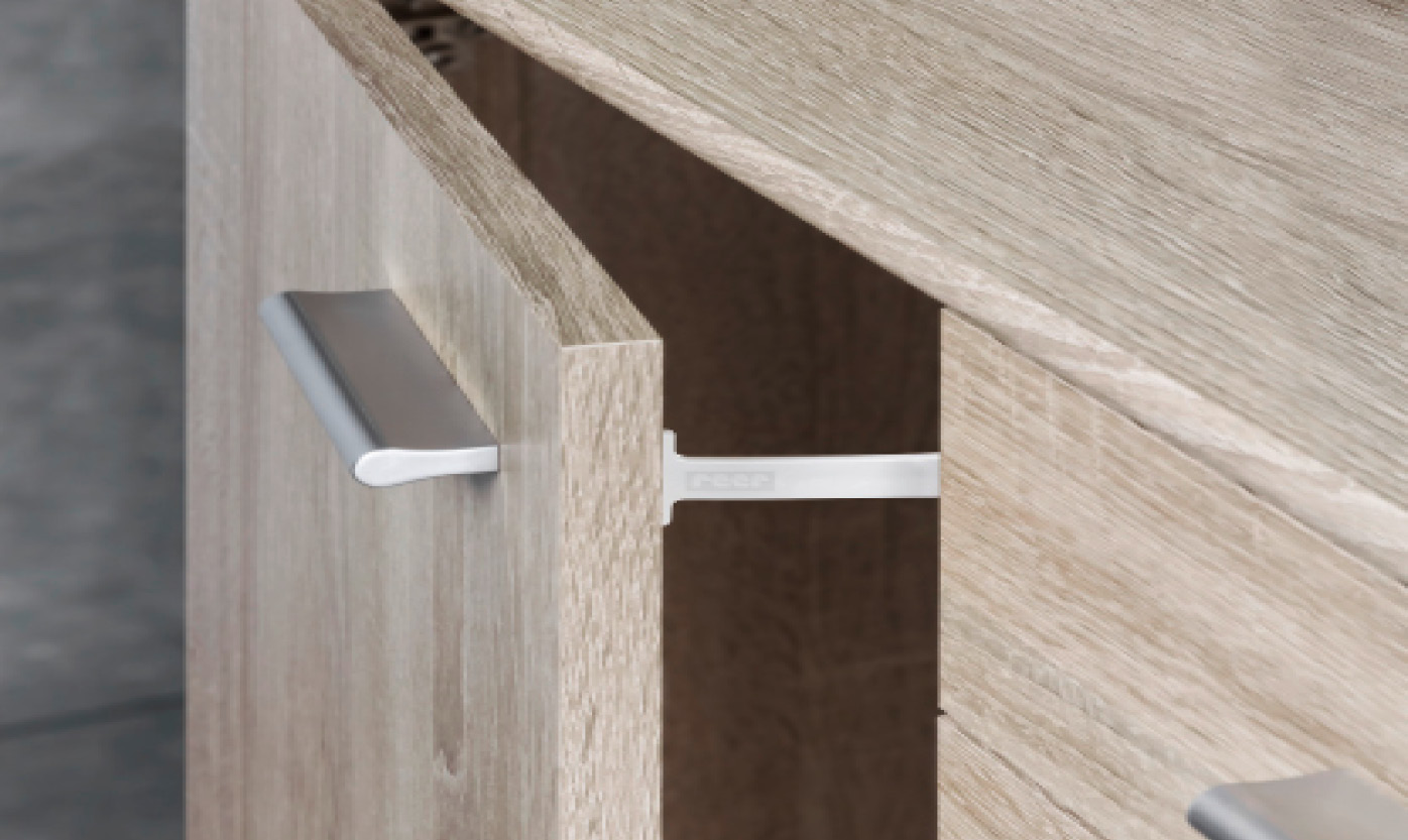 Childproofs cabinets and drawers