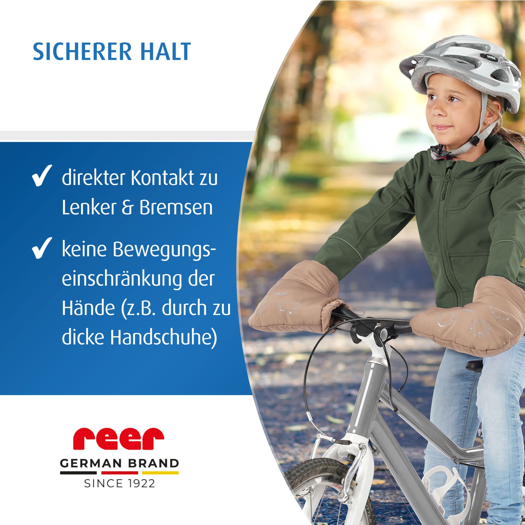 Junge auf Fahrrad mit Lenkerstulpen